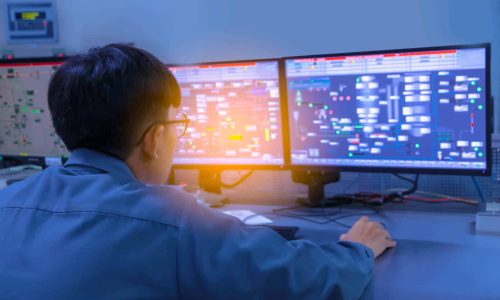 Engineering works with the tablet in the production control room